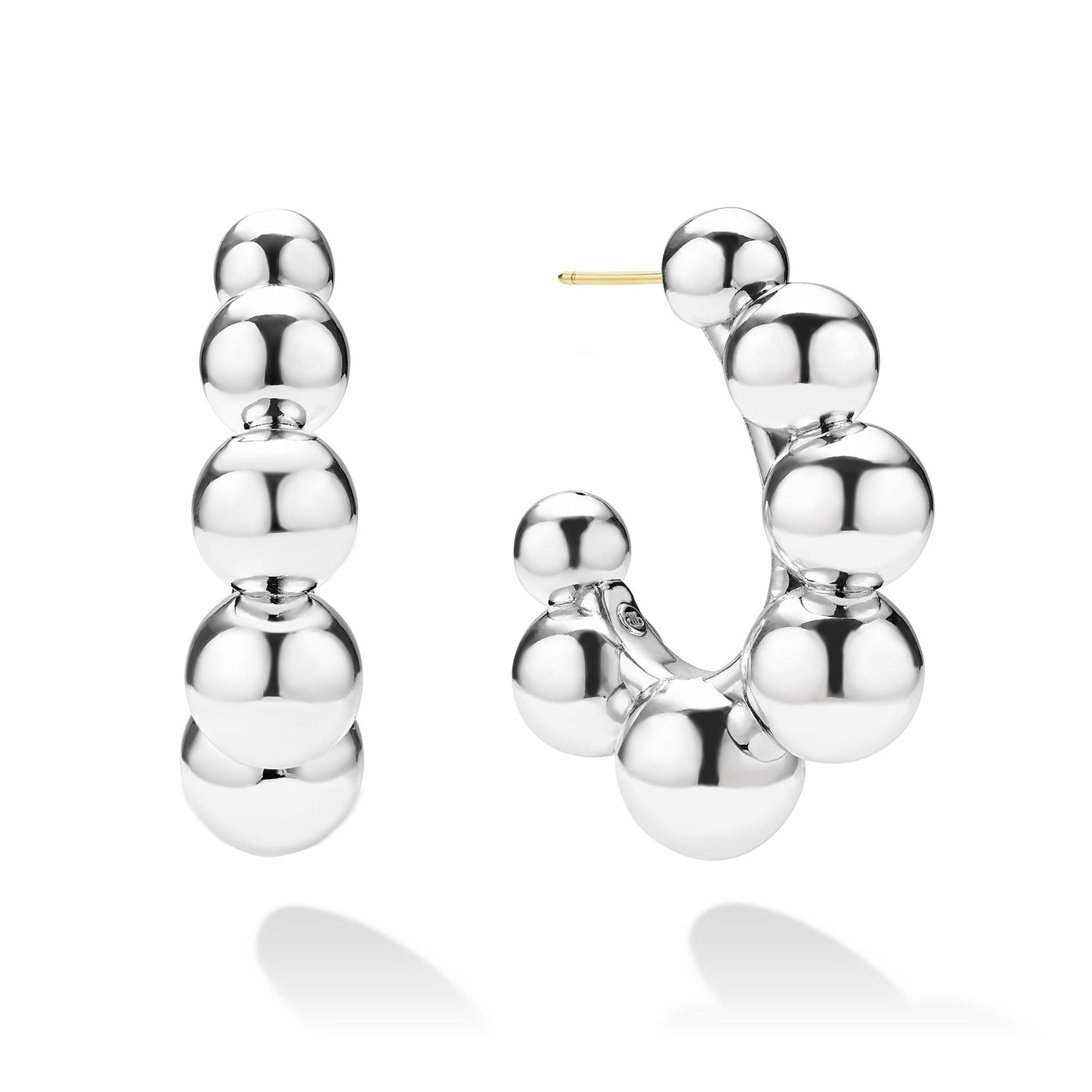 front of large beaded sterling silver hoop earrings