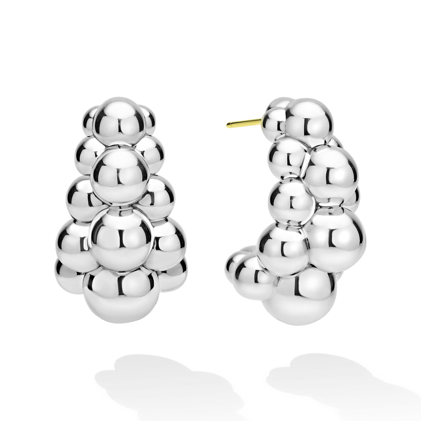 side of three-row beaded sterling silver statement hoop earrings