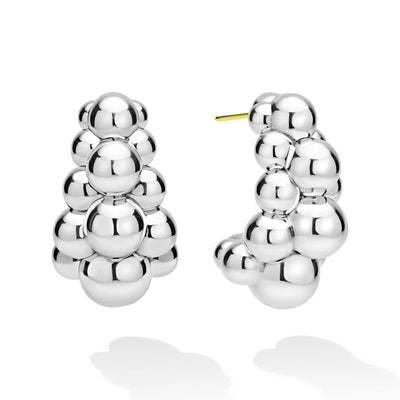 side of three-row beaded sterling silver statement hoop earrings