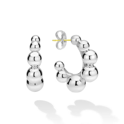 front of beaded sterling silver hoop earrings