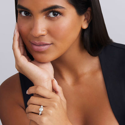 woman wearing sterling silver small to large beaded ring