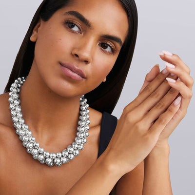 woman wearing 22mm sterling silver beaded statement necklace