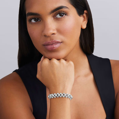 woman wearing 12mm sterling silver beaded statement bracelet