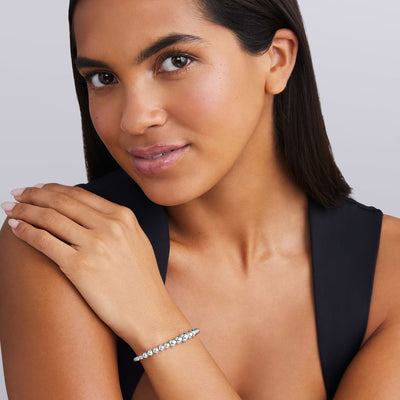 woman wearing 7mm sterling silver beaded cuff bracelet