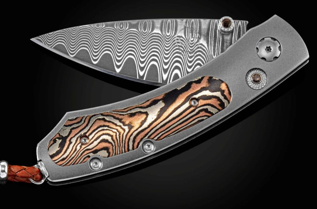Fierce Titanium folding knife with Mokume Gane and Wave Damascus