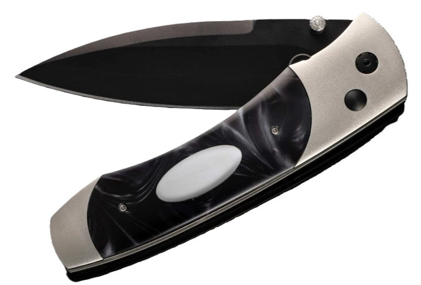 Titanium pocketknife with compressed acrylic resin and stainless blade