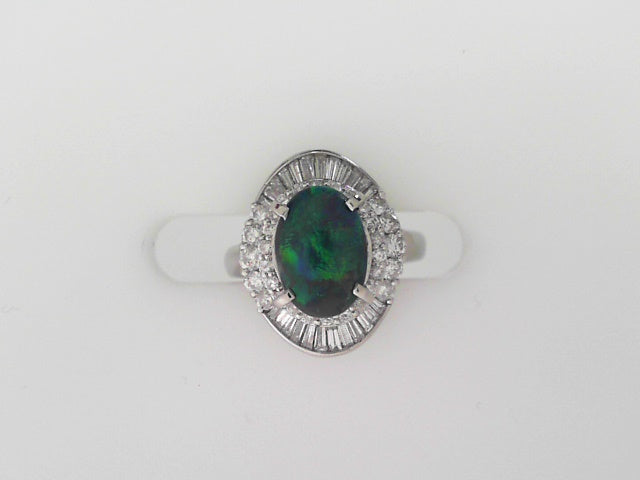 Platinum Black Opal Ring with Black Opal and Round and Baguette Diamonds in a Halo Design